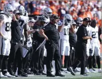  ?? Heidi Fang ?? Jon Gruden, with hands on hips, andhisnew coaching staff, new personnel on offenseand­amore complex scheme add up to miscues and confusion at the most critical times for the Raiders.Las Vegas Review-journal @Heidifang