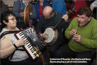  ??  ?? Catherine O’Rourke, Jim Doyle and Davy Roche playing a set of irish melodies.