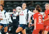  ??  ?? Tottenham Hotspur’s Alex Morgan (center) vies for the ball with Reading’s Angharad James (second right) during an English Women’s Super League soccer match. — Ti Gong