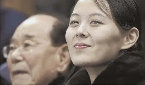  ?? AP PHOTO ?? MAKING A SPLASH: Kim Yo Jong, right, sister of North Korean leader Kim Jong Un, and North Korea’s nominal head of state Kim Yong Nam attend yesterday’s Olympic hockey game between the Koreas and Switzerlan­d.