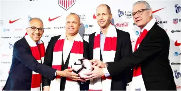  ??  ?? (From left) Cordeiro, National Team General Manager Earnie Stewart, Berhalter, and CEO Dan Flynn pose for a photo after a press conference to introduce Berhalter as US Men’s National Team head coach at The Glasshouse­s in New York City. — AFP photo
