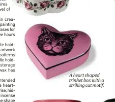  ??  ?? A heart shaped trinket box with a striking cat motif.