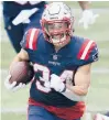  ?? KRUPA/AP
CHARLES ?? Patriots running back Rex Burkhead scored three total touchdowns in Sunday’s win over the Raiders in Foxborough, Mass.