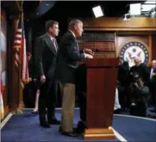  ?? JACQUELYN MARTIN — THE ASSOCIATED PRESS ?? Chairman of the Senate Intelligen­ce Committee Sen. Richard Burr, R-N.C., center, arrives for a news conference with Vice Chairman Sen. Mark Warner, D-Va., left, where they gave a preview of the committee’s findings on Russia’s hacks of state election...