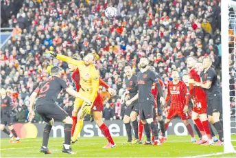  ??  ?? Liverpool’s Champions League match against Atletico Madrid on March 11 was played in front of 52,000 supporters. - AFP photo