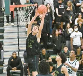  ?? JEFFREY F. BILL/BALTIMORE SUN MEDIA ?? Kain Corkeron, shown against Atholton during a game in December, had 30 points to lead Wilde Lake to an 83-68 victory over Howard on Monday.