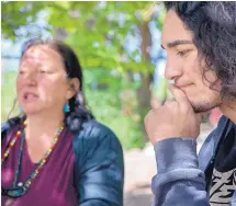  ?? EDDIE MOORE/JOURNAL ?? Thomas Gray, who is 19, along with his mother Lorraine Gray speak at a news conference in May about Thomas and his brother being pulled off a campus tour at Colorado State University.