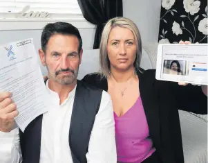  ??  ?? Campaigner­s Kenny and Lisa have been waiting for two years on the Scottish Government to implement Michelle’s law