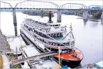  ?? ASSOCIATED PRESS FILE PHOTO ?? The Delta Queen riverboat is moored at Coolidge Park on in downtown Chattanoog­a, Tenn. The U.S. House on Tuesday approved a bill that will allow the Delta Queen to cruise the nation’s rivers once again after a 10-year layoff. President Donald Trump still must sign the bill.