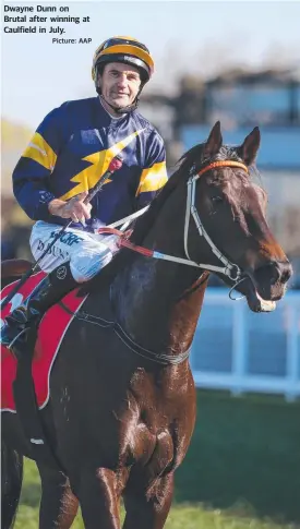  ?? Picture: AAP ?? Dwayne Dunn on Brutal after winning at Caulfield in July.