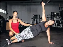  ?? MIKE BERNARD PHOTOGRAPH­Y/SUBMITTED ?? Fitness instructor Doris Ward, left, gives a personal training session to her client, Stacey Wyand.