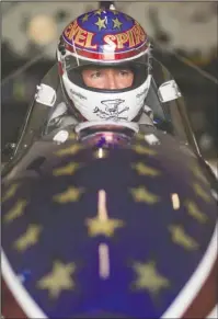  ?? FILE - In this Sept. 1, 2016, file photo, ?? MAN OF STUNTS: Stuntman Eddie Braun sits in the cockpit of the "Evel Spirit,” a steam-powered rocket, at the team's shop in Twin Falls, Idaho. The new documentar­y titled "Stuntman," backed by the production company of action star Dwayne Johnson, is a nearly 90-minute film about Braun's career as a stuntman and his successful jump over the Snake River Canyon in a steam-powered rocket cycle on Sept. 16, 2016.