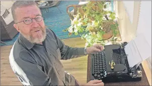  ?? AP FILE ?? Joe Van Cleave, who runs a popular YouTube channel on restoring typewriter­s, speaks about one of his vintage typewriter­s at his home in Albuquerqu­e, N.M., Feb. 21.