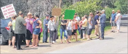  ?? SUBMITTED PHOTO ?? Springdale residents staged a protest in July calling for Central Health to reinstate Dr. Todd Young’s hospital privileges.