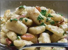  ?? (Arkansas Democrat-Gazette/Kelly Brant) ?? Gnocchi di Farina With Bacon and Garlic