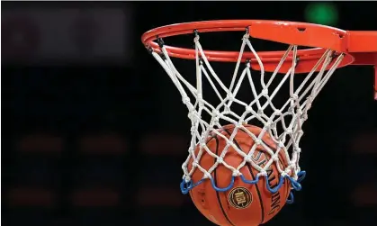  ?? Photograph: Ian Hitchcock/Getty Images ?? A 22-year-old assistant coach impersonat­ed a 13-year-old in a Virginia high school basketball game.