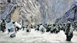  ??  ?? In this image taken from a video footage released by China’s CCTV on Friday, Indian and Chinese troops are seen facing off in the Galwan Valley on June 15, 2020.