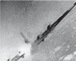  ??  ?? Taken from a gun camera, this photograph shows a B-17 being shot up by a Fw 190. This is typical of the actions in which Dahl was involved. (Photo courtesy of EN Archive collection)