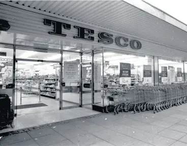  ??  ?? A notice on the window of Burton’s Tesco supermarke­t stipulates that it would open between 10am until 4pm but could only sell beers, wines and spirits between the hours of noon and 3pm