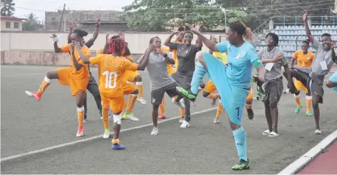  ??  ?? Cote d’Ivoire’s Les Elephantes players celebrate after holding the Super Falcons to 1-1 draw on Monday to move to the next stage of the 2020 Olympics qualifiers