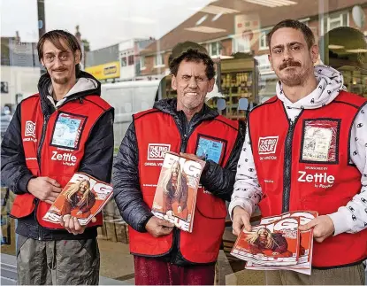  ?? Exposure Photo Agency/SWNS ?? Big Issue vendor Dave Besley (centre) with his sons