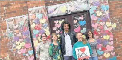  ??  ?? ●●Kieran King, Beth Noble, Jamie Lee, Morgan Harper-Jones and Holly-Ann Golightly with the messages of support they have posted on the Jamia Qasmia Mosque after it was fire-bombed