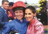  ?? AFP ?? McEvoy and his wife Cathy after he won the Melbourne Cup on British horse Cross Counter.