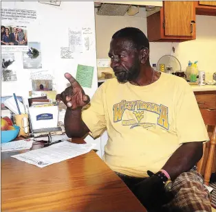  ?? Ernest A. Brown/The Call ?? Wallace Simmons, 63, of Woonsocket, is looking to revive his ‘Colors United’ program, which, years ago, assisted youth ages 7 to 21. At his apartment this week, he discussed his life since coming to Woonsocket as a Vietnam veteran at age 19 and the...