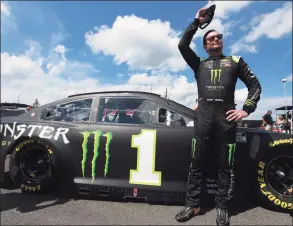  ?? Sean Gardner / Getty Images ?? Kurt Busch waves to fans on the grid prior to the NASCAR Cup Series Explore the Pocono Mountains 350 at Pocono Raceway in June.