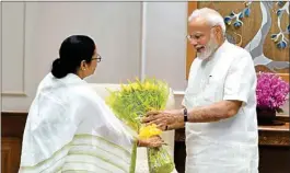  ?? PIC/MPOST ?? Prime Minister Narendra Modi being greeted by West Bengal Chief Minister Mamata Banerjee during a meeting, in New Delhi, Wednesday