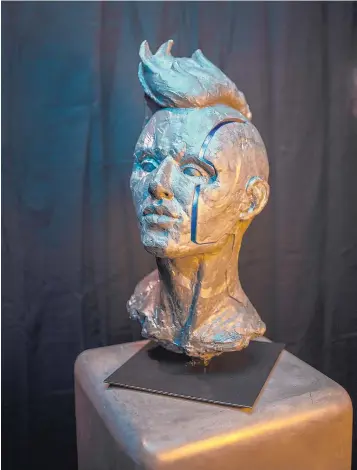  ??  ?? Artist Virgil Ortiz creates fashion, as well as sculpture. He will be showing during this year’s Indian Market.