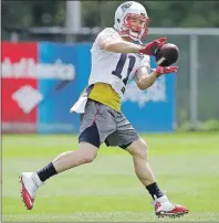  ?? AP PHOTO ?? New England Patriots wide receiver Julian Edelman makes a catch during NFL practice on June 8 in Foxborough, Mass.