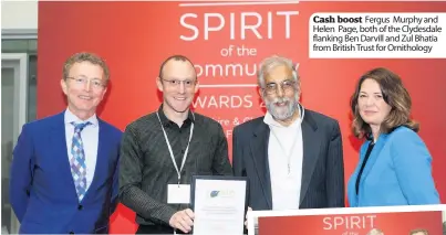  ??  ?? Cash boost Fergus Murphy and Helen Page, both of the Clydesdale flanking Ben Darvill and Zul Bhatia from British Trust for Ornitholog­y