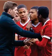  ?? PROPAGANDA ?? Flashpoint: coach Gerrard tries to calm down the furious Brewster