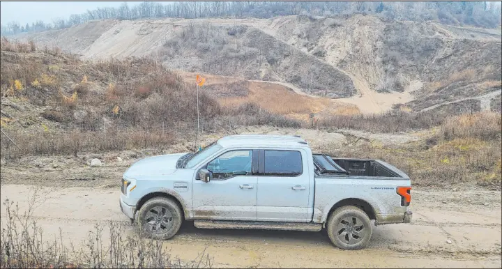  ?? Henry Payne The Detroit News ?? Holly Oaks ORV Park in Michigan offers good metro off-roading within the 300-mile EV range of the 2023 Ford F-150 Lightning EV.