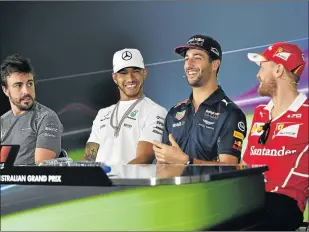  ?? Picture: AFP ?? THE FAST LANE BRIGADE: Formula One drivers, from left, McLaren’s Spanish driver Fernando Alonso, Mercedes’ British driver Lewis Hamilton, Red Bull’s Australian driver Daniel Ricciardo and Ferrari’s German driver Sebastian Vettel share a joke at a press...