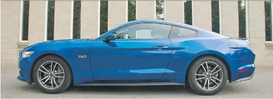  ?? LESLEY WIMBUSH/DRIVING ?? The 2017 Ford Mustang GT Coupe’s 5.0-L engine puts out 435 horsepower.