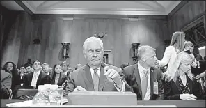  ?? AP/JACQUELYN MARTIN ?? Secretary of State Rex Tillerson takes his seat Tuesday on Capitol Hill to testify before the Senate Foreign Relations Committee.