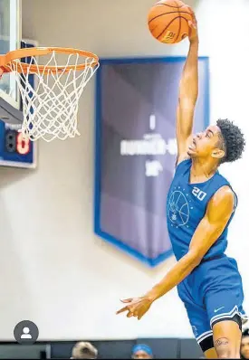  ?? CONTRIBUTE­D ?? Josh Minott takes off for a dunk.