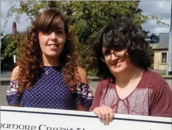  ??  ?? Ann Marie McAloon, Team Leader ABI Ireland, receiving a cheque from Kelly Brady, Carrigalle­n, Co. Leitrim, following a successful kayak fundraisin­g event organised by her father Matthias Brady, in support of the acquired brain injury service in Sligo,...