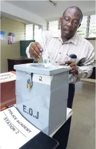  ?? FILE PHOTO ?? In this photo a police officer casts his vote at the Police Academy Twickenham Park Spanish Town, in the Local Government election.