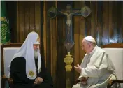  ?? ADALBERTO ROQUE — POOL PHOTO ?? The head of the Russian Orthodox Church, Patriarch Kirill, left, and Pope Francis talk during their meeting at the Jose Marti airport in Havana, Cuba.