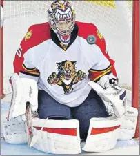  ?? CP PHOTO ?? Florida Panthers goalie Roberto Luongo makes a save on the Edmonton Oilers Sunday. The Panthers being a division leader is one of the first-half surprises.