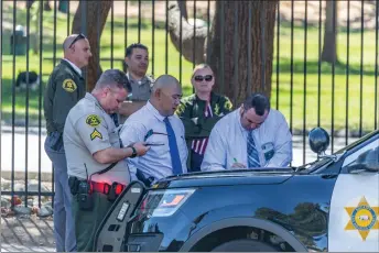  ?? Cory Rubin/The Signal ?? Dozens of deputies responded to reports of a deputy-involved skirmish in front of William S. Hart Park at the corner of 6th Street and Newhall Avenue. A woman was detained after attempting to flee deputies.