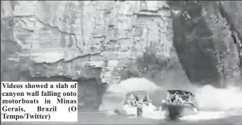  ?? (O Tempo/Twitter) ?? Videos showed a slab of canyon wall falling onto motorboats in Minas Gerais, Brazil