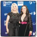  ?? Drew Altizer / Drew Altizer Photograph­y ?? GLAAD President Sarah Kate Ellis (left) with honoree actor Alyssa Milano at the GLAAD Gala in S.F. from the 1973 kidnapping of her late brother, John Paul Getty III, in Rome. Since 2004 when she establishe­d the Ariadne Getty Foundation, Getty has quietly assisted disenfranc­hised population­s.But as the proud mother of two gay children and a current GLAAD trustee, Getty’s going big: She’s pledged $2 million