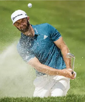  ?? NATHAN DENETTE/THE CANADIAN PRESS ?? Dustin Johnson, the world’s top-ranked golfer, shot 68 and lurks five shots off the pace at Glen Abbey.