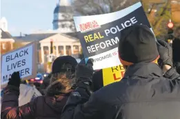  ?? KIM HAIRSTON/BALTIMORE SUN ?? Maryland Coalition for Justice & Police Reform activists march from Annapolis District Court to Lawyers Mall on Thursday to demand “real police reform, now.”