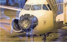  ?? BEAU SORENSEN, AP ?? Hail damaged the nose cone and windshield of the Airbus A320 that was caught in a storm Friday on its way to Salt Lake City. The flight made an emergency landing in Denver.