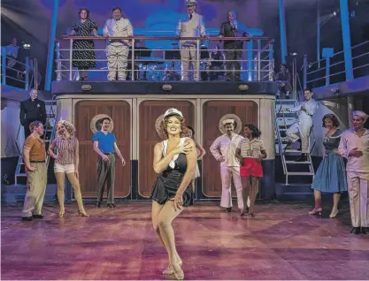  ?? LIZ LAUREN PHOTOS ?? Reno (Meghan Murphy) leads the cast of “Anything Goes” at Porchlight Music Theatre.